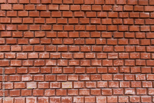 Wall of an old red brick building