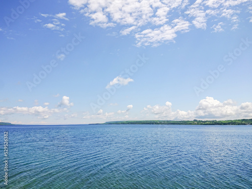 Landscape of the Huron Lake water and greenery at day in Georgian Bay near Spirit Rock Conservation Area at Wiarton, Ontario, Canada. photo