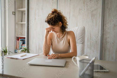 One young business woman overworked had stressful day in the office