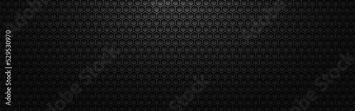 Hexagon metal background. Black 3d grid with light and shadow. Dark futuristic cells. Industrial perforated texture. Modern carbon wallpaper. Vector illustration © Vegorus
