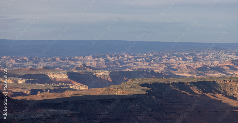 Scenic American Landscape and Red Rock Mountains in Desert Canyon. Spring Season. Canyonlands National Park. Utah, United States. Nature Background. Sunrise