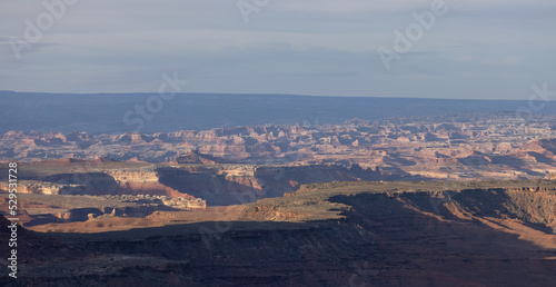 Scenic American Landscape and Red Rock Mountains in Desert Canyon. Spring Season. Canyonlands National Park. Utah, United States. Nature Background. Sunrise