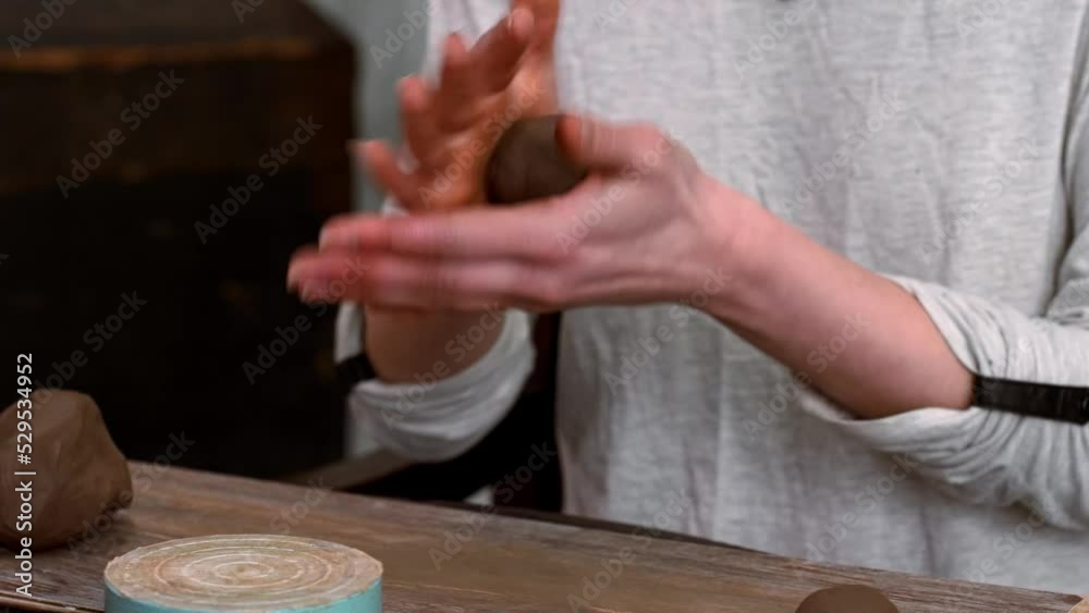 Workmanship concept. Woman make product from clay hold piece of focus on hands. High quality 4k footage Workmanship concept. Woman make product from clay hold piece of focus on hands. High quality 4k footage