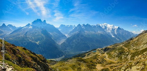 Mountain landscape in Chamonix. Hiking holidays with a breathtaking view of the Mont Blanc massif. Flowers and mountain lake. High quality photo