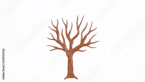 Bare tree without leaves molded from plasticine. White background.