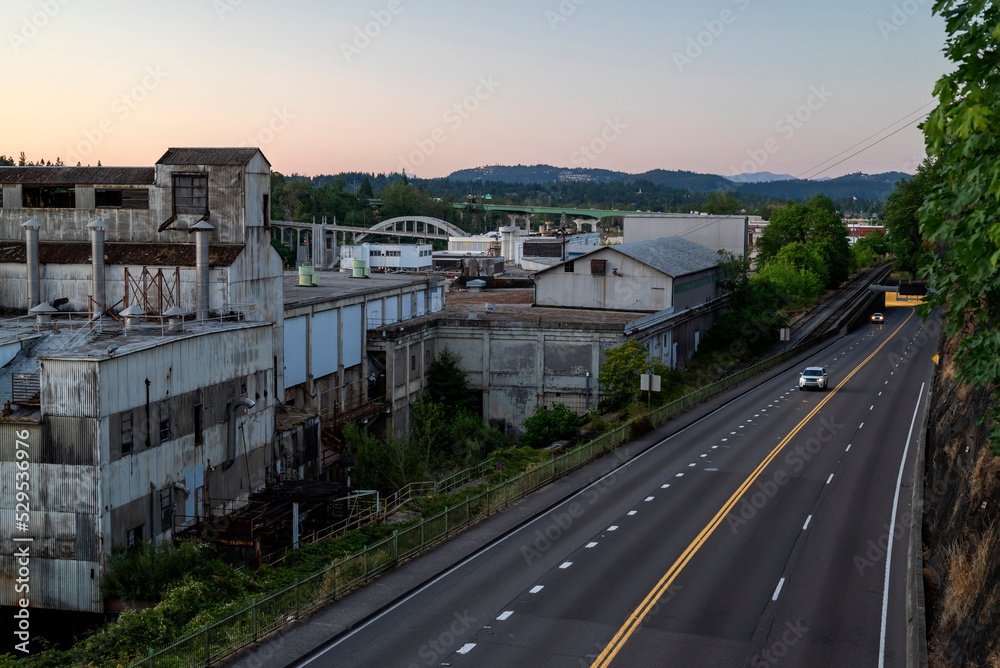 Abandoned industrial area beside highway