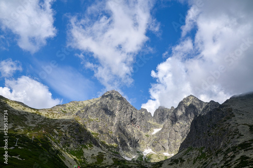 Scenic view of Lomnicky peak and Kezmarsky peak from Skalnate pleso mountain lake. High Tatras  Slovakia