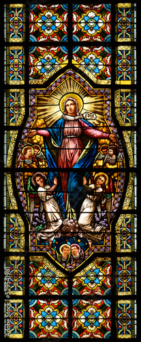 Stained-glass window depicting the Assumption of the Virgin Mary. Blumental church in Bratislava, Slovakia. 2021/07/20. photo