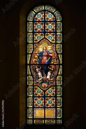 Stained-glass window depicting the Assumption of the Virgin Mary. Blumental church in Bratislava, Slovakia. 2021/07/20. photo