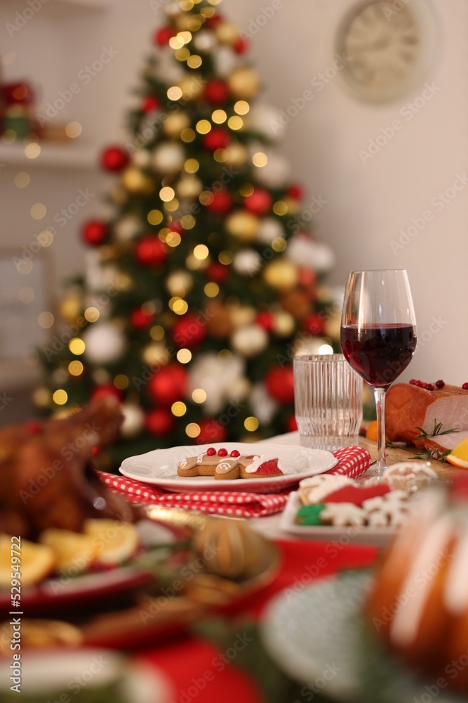 Festive dinner served on table indoors. Christmas Eve celebration Festive dinner served on table indoors. Christmas Eve celebration