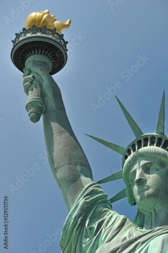 Head, crown and torch arm of the Statue of Liberty.