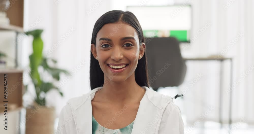 Happy woman, smile and portrait of Indian girl feeling content and showing a positive attitude at home. Young female smiling and showing her beautiful face and enjoying her free time in her apartment Happy woman, smile and portrait of Indian girl feeling content and showing a positive attitude at home. Young female smiling and showing her beautiful face and enjoying her free time in her apartment