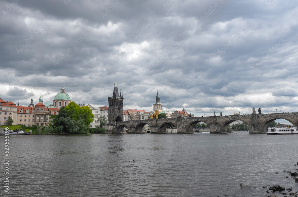 Scenic view of of the Vltava river, Charles Bridge and Old Town Bridge Tower in Prague