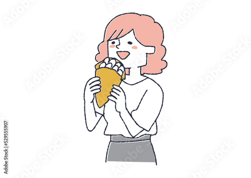 クレープを食べる女性　美味しそうにスイーツを食べている人々