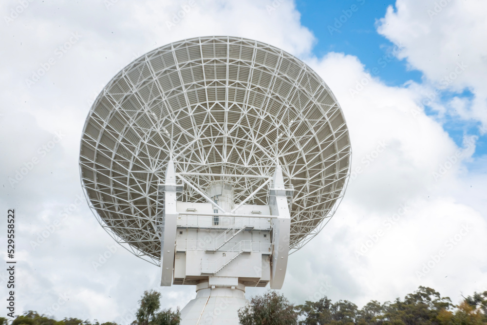 Satellite dish in a blue sky