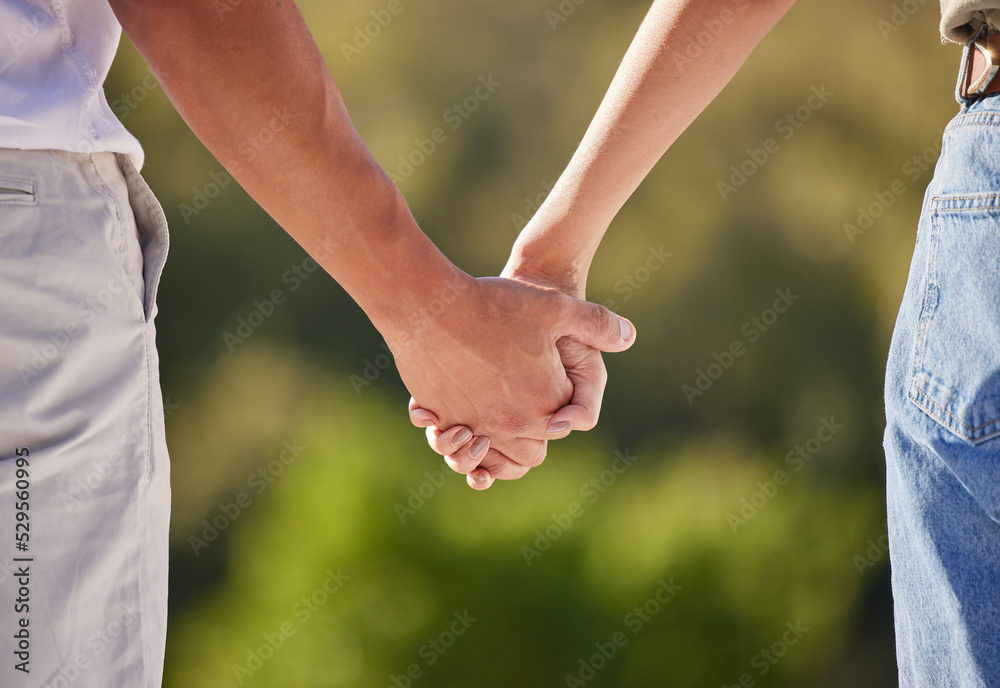 Hand, love and couple with a man and woman holding hands outside in care, trust and relationship. Closeup of a male and female walking outside together for romance and affection with trust outdoors Hand, love and couple with a man and woman holding hands outside in care, trust and relationship. Closeup of a male and female walking outside together for romance and affection with trust outdoors