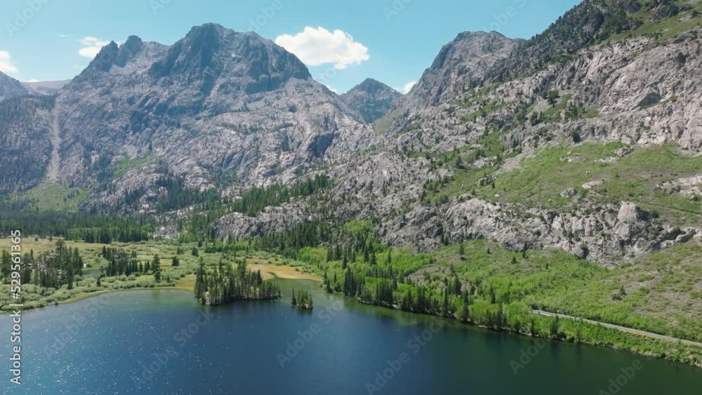 June Mountain ski area with cinematic blue Silver lake with scenic rocky mountain peaks. Beautiful peaceful place for weekend leisure activity California. June lake loop in Mammoth ski recreation area June Mountain ski area with cinematic blue Silver lake with scenic rocky mountain peaks. Beautiful peaceful place for weekend leisure activity California. June lake loop in Mammoth ski recreation area