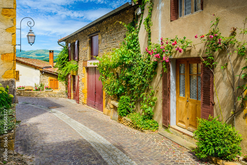 In the street of the medieval village Ternand in France