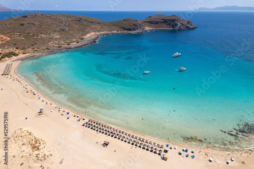Fototapeta Naklejka Na Ścianę i Meble -  Aerial view of Simos beach in Elafonisos. Located in south  Peloponnese elafonisos is a small island very famous for the paradise sandy  beaches and the turquoise waters.