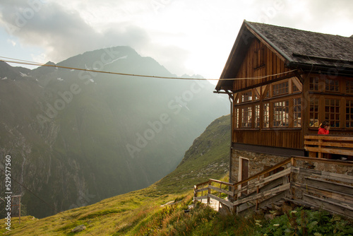 Fototapeta mountain hut in the mountains