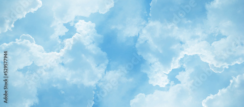 Abstract fantastic and realistic blue sky background, blurry and puffy cloudscape morning sky of the winter season, blue watercolor shades clouds of blue natural sky with clouds.