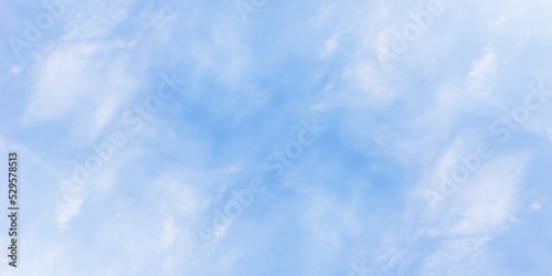 Tiny clouds covered the winter seasonal morning blue sky background, fresh and clear view of morning sky with puffy clouds, beautiful sky background for wallpaper, calender, cover and any design.