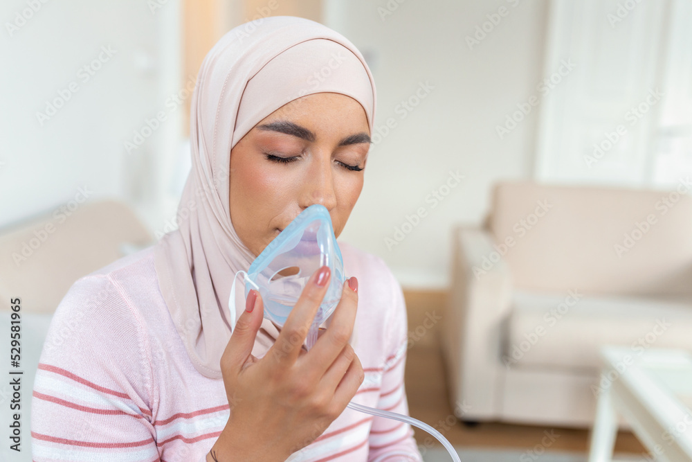Sick muslim woman with hijab on oxygen mask inhalation, pneumonia ...