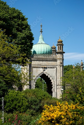 Vertical high angle shot of North Gate at the Royal Pavilion in Brighton, with trees around photo