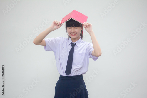 asia thai Junior high school student uniform beautiful girl and a book