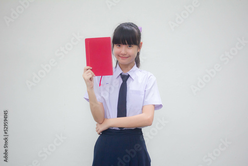 asia thai Junior high school student uniform beautiful girl show a book