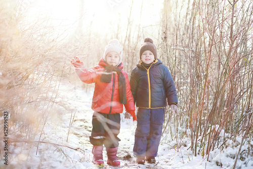 Children in winter park play