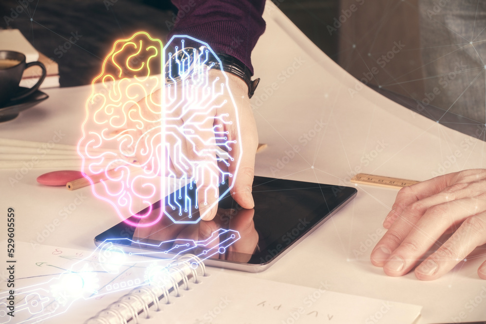Double exposure of man's hand holding and using a digital device and brain hologram drawing. Data concept. Double exposure of man's hand holding and using a digital device and brain hologram drawing. Data concept.