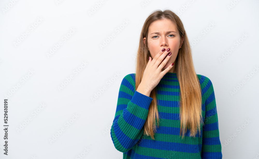 Young caucasian woman isolated on white background yawning and covering wide open mouth with hand Young caucasian woman isolated on white background yawning and covering wide open mouth with hand