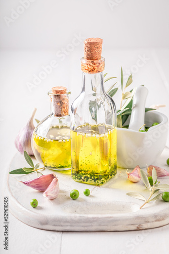 Aromatic and healthy oil with garlic and herbs.