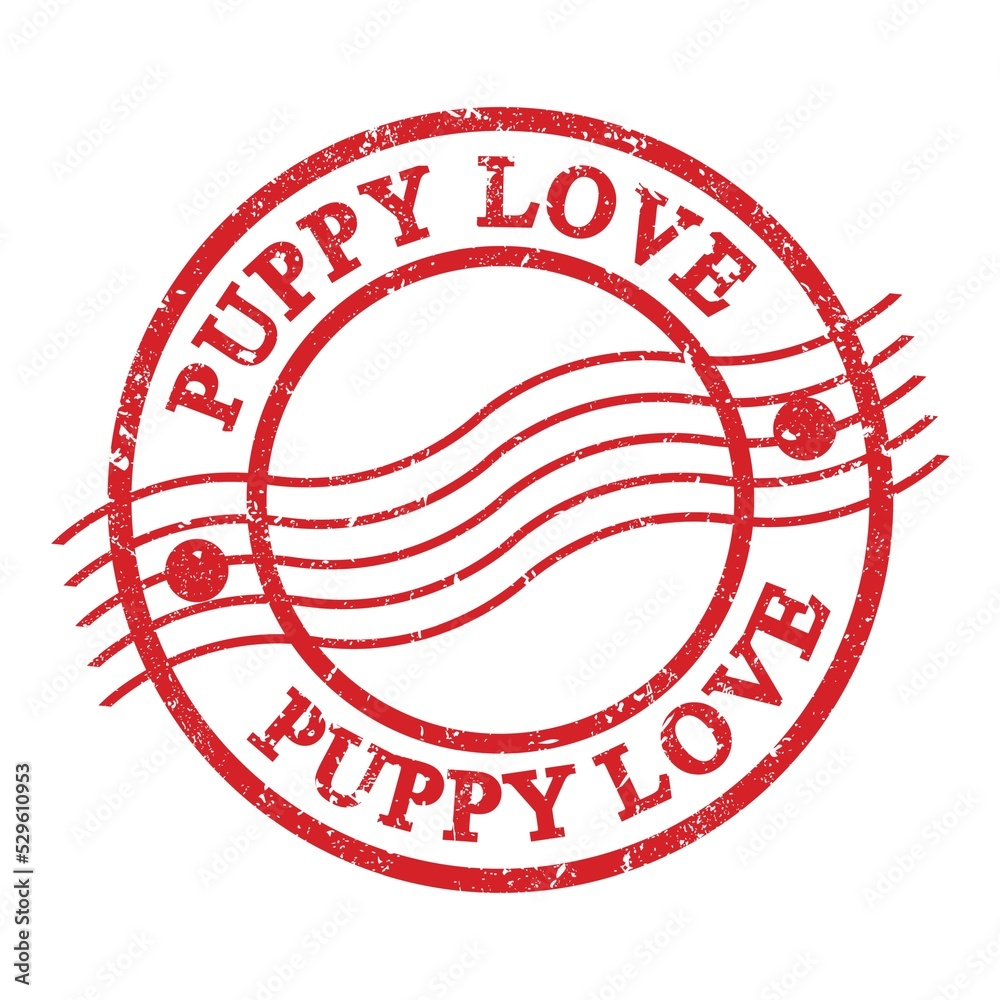 PUPPY LOVE, text written on red postal stamp. PUPPY LOVE, text written on red postal stamp.