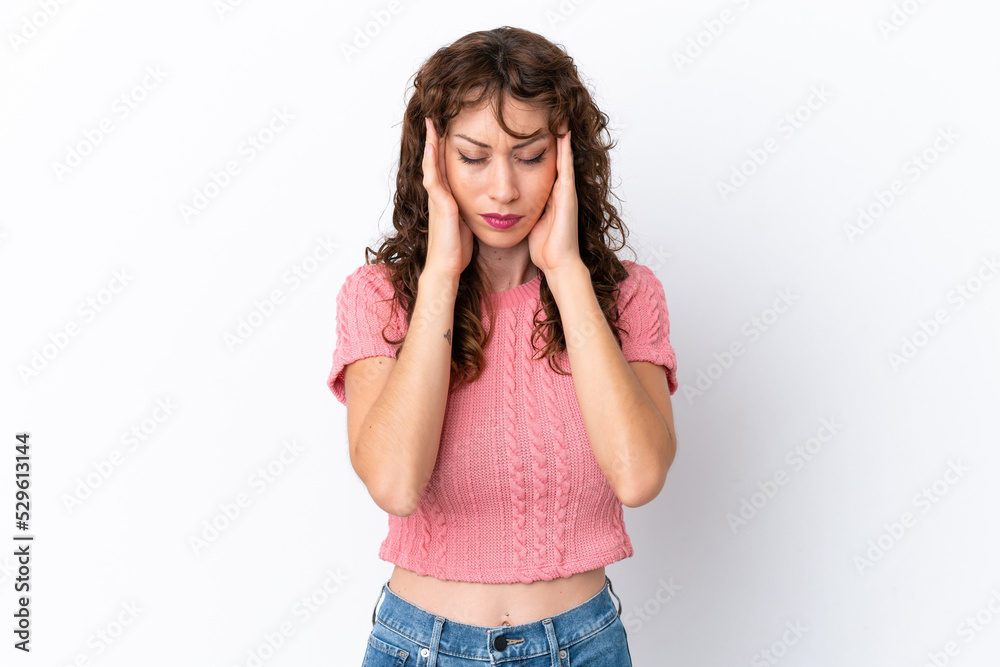 Young woman with curly hair isolated on white background with headache Young woman with curly hair isolated on white background with headache