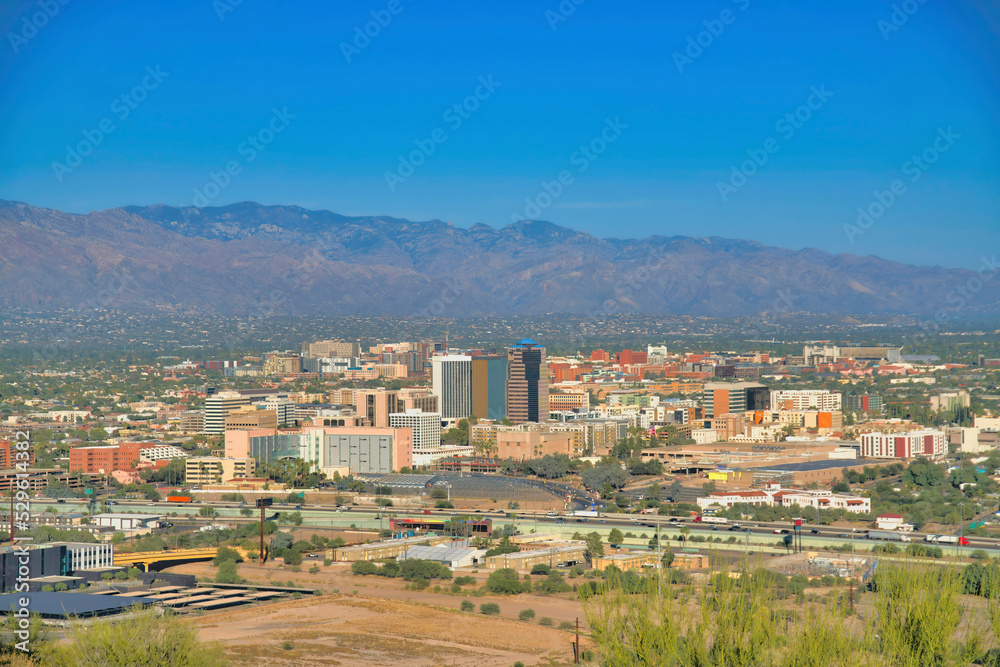 Panoramic aerial view of downtown Tucson Arizona against sunny blue sky