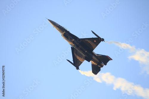 f 16 fighter jet in Turkish Air Force aerobatic demonstration team which called Turkish Stars are flying on the sky for 9 September- Izmir Independence Day