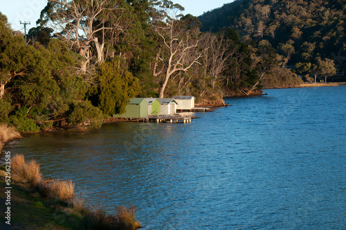 Nubeena Australia, view along coastline to boatsheds  photo