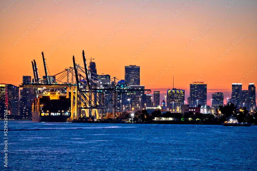 Port of Miami docks and cranes dusk view