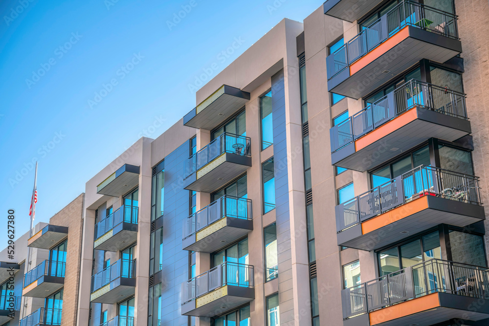 Condominiums with balconies against blue sky in Tucson Arizona neighborhood