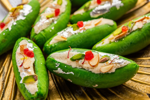 Parwal Mithai is a popular North Indian sweet called Parval Pak, made using pointed gourd and khoya photo