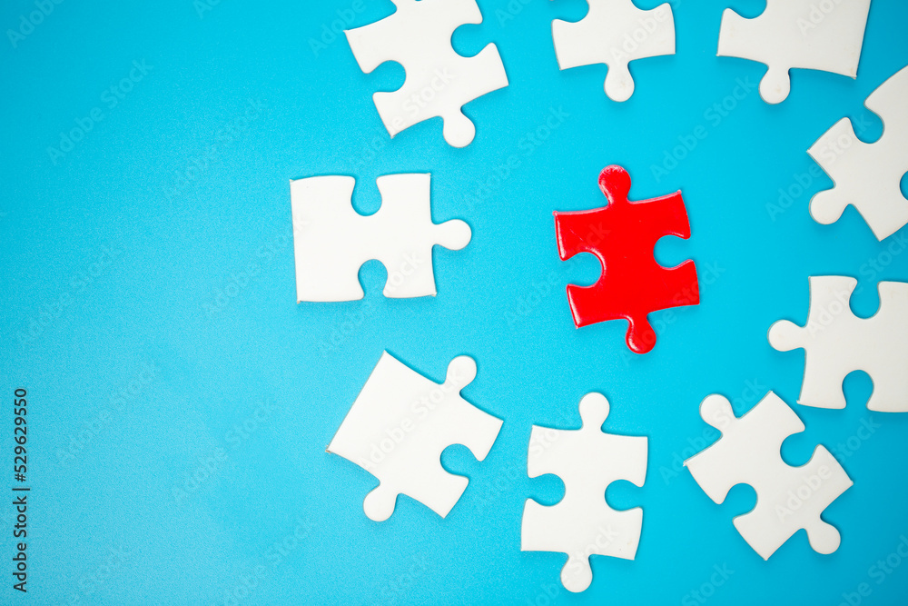 White part of jigsaw puzzle pieces on blue background. concepts of problem solving, business success, teamwork, Team playing jigsaw game incomplete, Texture photo with copy space for text White part of jigsaw puzzle pieces on blue background. concepts of problem solving, business success, teamwork, Team playing jigsaw game incomplete, Texture photo with copy space for text