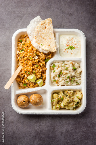 Indian Upwas thali, fasting food platter or thali for home delivery or takeaway parcel for any Vrat