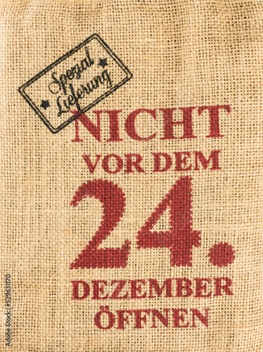 Weihnachtsgeschenk im Jutesack photo