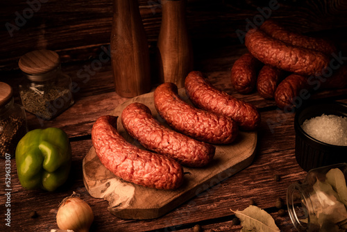 Sausages on wooden board