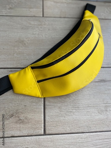 yellow waist bag photo