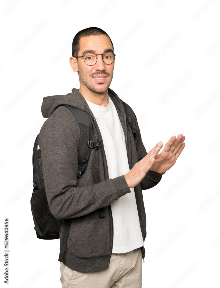 Fototapeta premium Doubtful student doing a gesture of keep calm