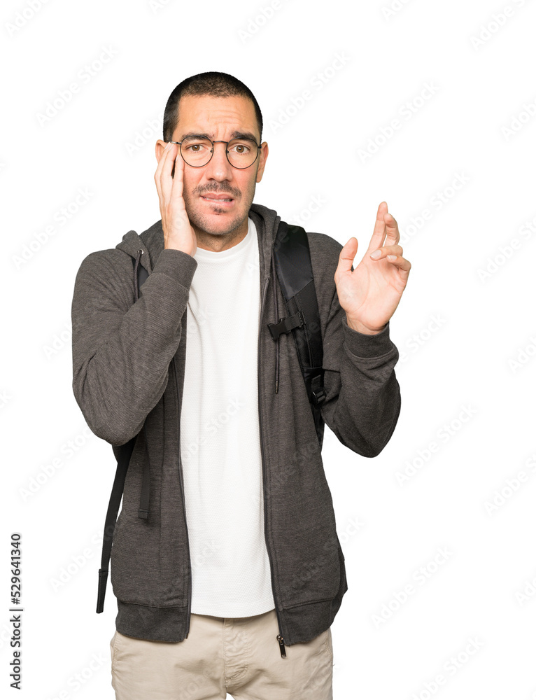 Crazy student making a nervous gesture Crazy student making a nervous gesture