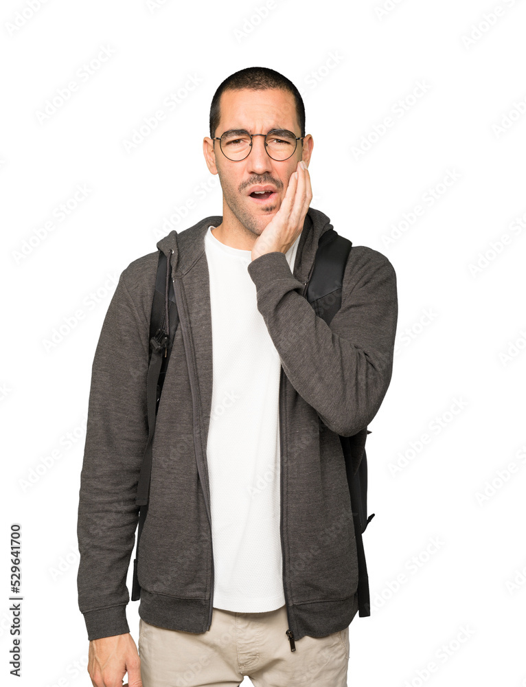 Concerned student with a toothache gesture Concerned student with a toothache gesture
